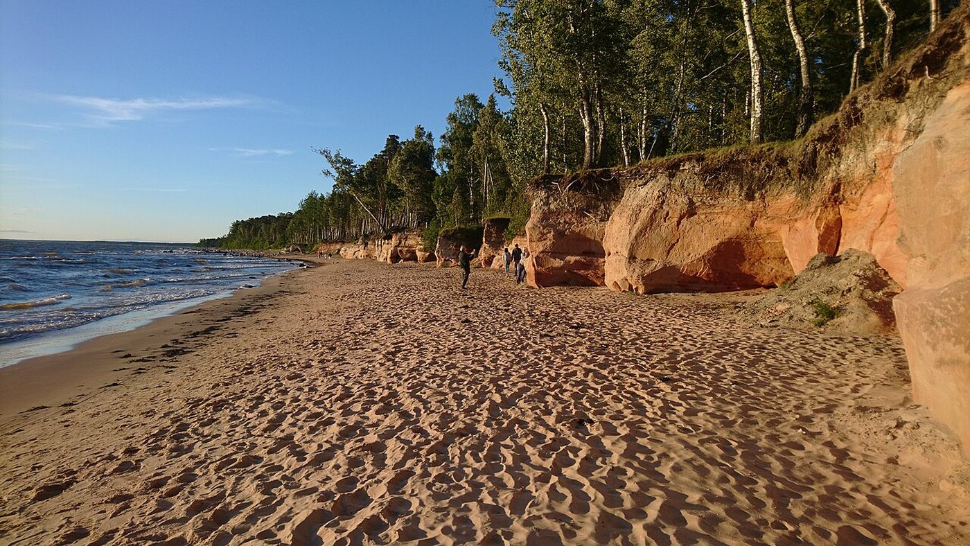 Red sandstone sea cliffs at Veczemju klintis